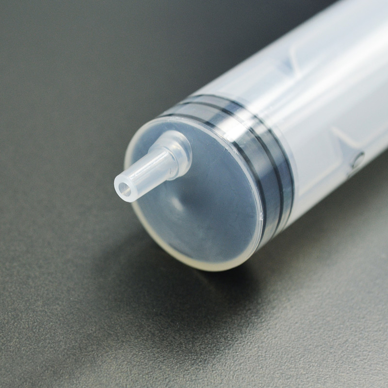 Disposable three-parts syringe luer slip